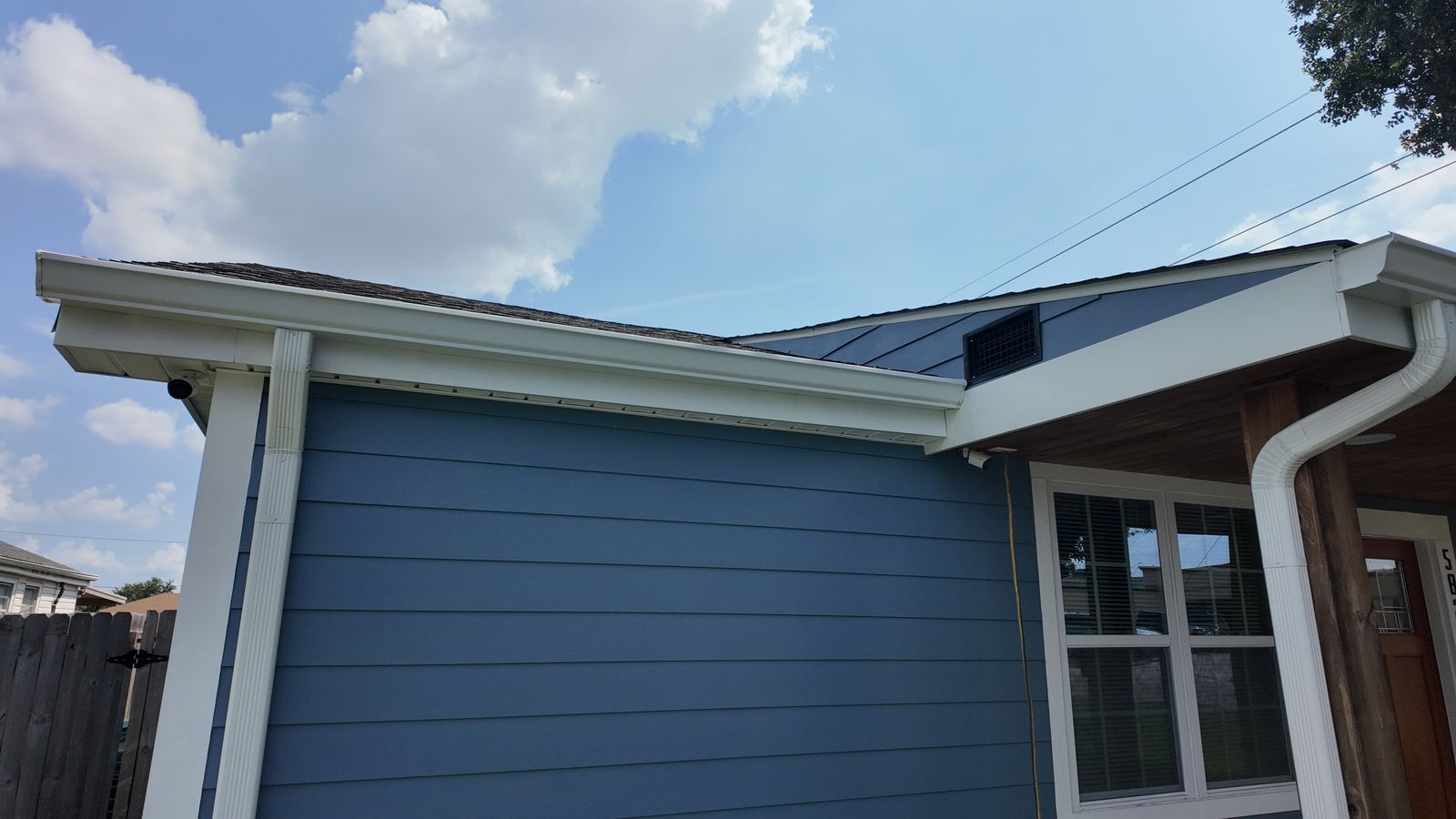 Close-up of a seamless K-style gutter installed along the roofline of a New Orleans area home